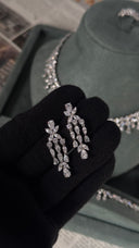 Close up bridal earrings with teardrop crystals for wedding jewelry