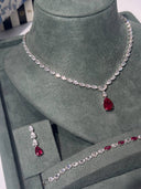 Close-up of red teardrop bridal necklace with zircon sparkle