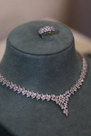 Close-up bridal necklace with marquise zircon stones forming floral pattern