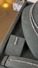 Bridal drop earrings with round zircon stones in vertical tennis design