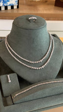 Close-up of double layer bridal tennis necklace with round zircon stones