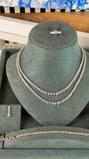 Bridal wedding jewelry set with double layer tennis necklace, matching bracelet, drop earrings and zircon ring