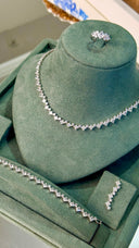 Swarovski zirconia necklace and earrings set with brilliant diamond look for bridal and evening wear