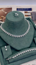 Close-up of bridal pearl necklace with round pearls and zircon stones