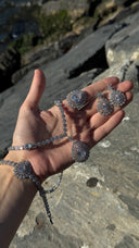 Aviola luxury bridal jewelry set styled on hand with elegant wedding shine