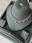 Detailed view of bridal pearl necklace with evenly spaced pearls and floral zircon pattern