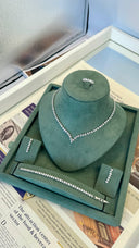 Full bridal jewelry set display with necklace bracelet earrings and ring