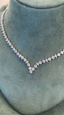 Side angle of V shape bridal necklace showing detailed zircon arrangement