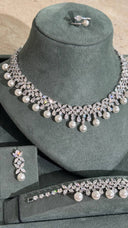 Aviola wedding pearl and crystal necklace set with elegant floral drop design