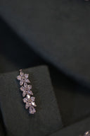 Bridal leaf earrings with marquise zircon stones in detailed close-up view