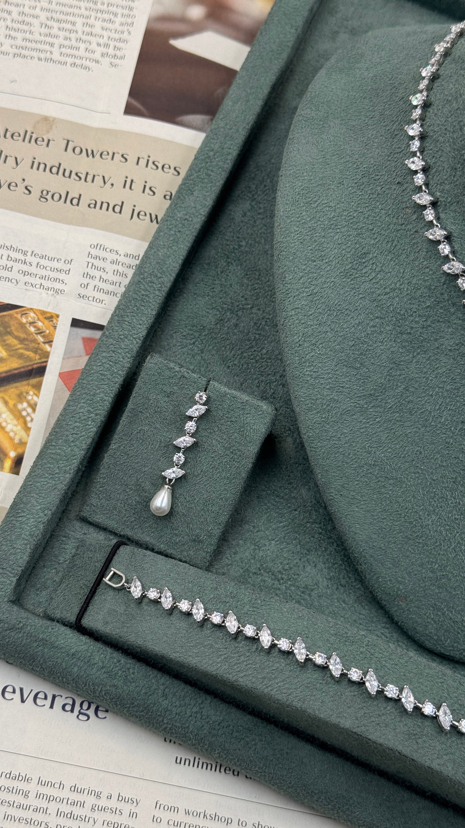 Elegant bridal necklace with pearl drop and crystal stones