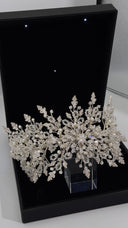 Angled view of silver bridal hair vine showing crystal branches and pearl details
