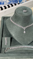 Monaco bridal jewelry set in silver tone with teardrop cubic zirconia necklace, earrings and bracelet, rhodium plated finish.