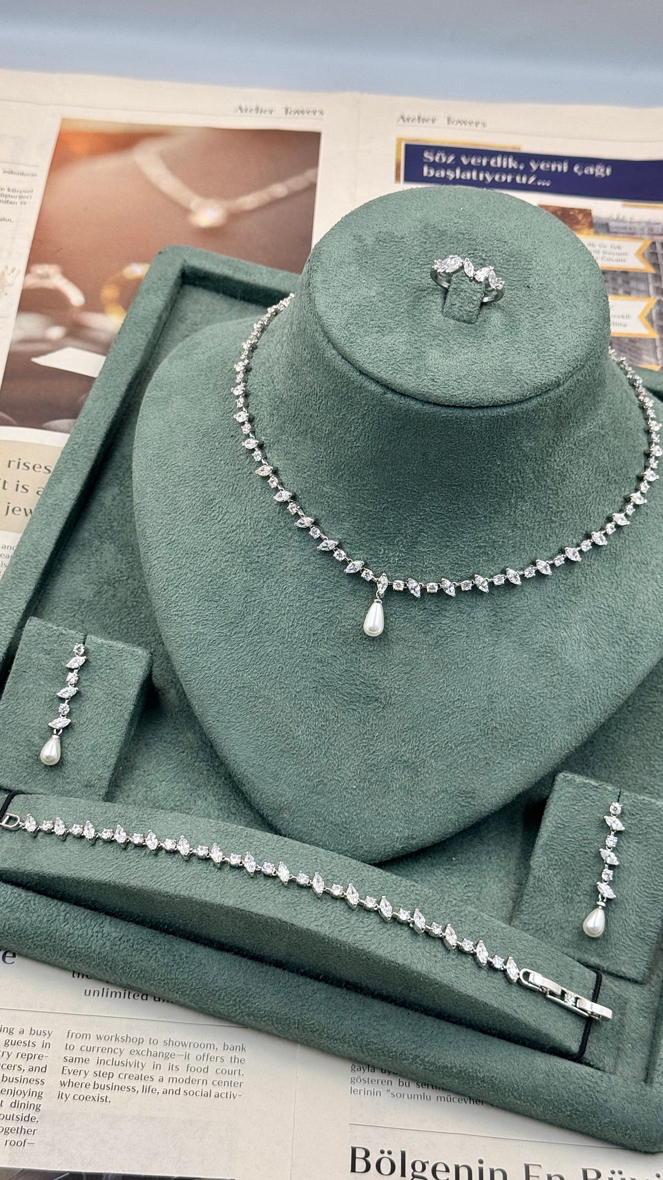 Close up of bridal necklace with central pearl drop