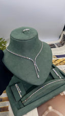 Complete bridal jewelry set with a clear zircon double-drop Y necklace, earrings, tennis bracelet and adjustable ring