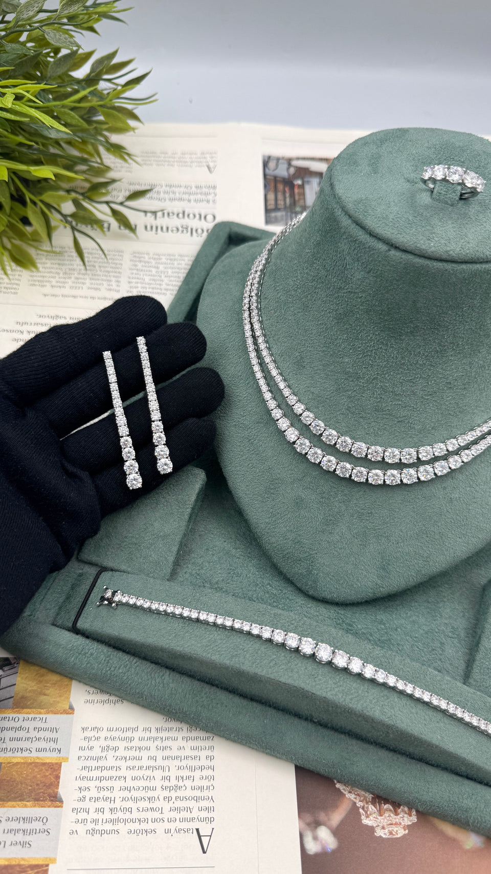 Complete silver bridal jewelry set with a double-row zircon tennis necklace, long earrings, bracelet and five-stone ring