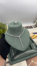 Five-piece bridal wedding jewelry set with Y necklace, teardrop earrings, two bracelets and adjustable pear-cut ring