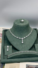 Elegant bridal jewelry set with teardrop zirconia necklace and earrings