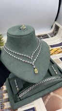 Complete bridal wedding jewelry set with layered pear-cut necklace, yellow pendant, bracelet, earrings and ring