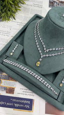 Pear-cut zircon bridal jewelry set with layered yellow pendant necklace, matching bracelet and drop earring