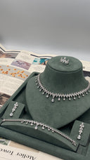 Full silver bridal wedding jewelry set with a marquise leaf necklace, two long earrings, bracelet and adjustable ring