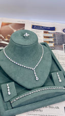 Close up of como teardrop crystal necklace with sparkling stones