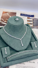 Como teardrop crystal bridal jewelry set worn on hand elegant look