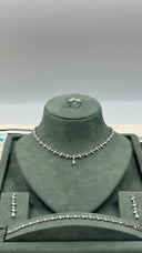 Elegant bridal necklace with small teardrop stones and subtle drop