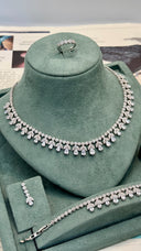 Complete 4-piece CZ wedding jewelry set – necklace, bracelet, drop earrings and ring by Aviola