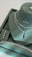 Double layer pear cut bridal necklace with matching drop earring tennis bracelet and adjustable ring