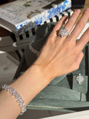 Bridal jewelry set worn on hand showing elegant ring and bracelet