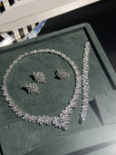 Silver jewelry set including necklace, bracelet, and earrings