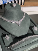 Silver jewelry set including necklace, earrings, and ring