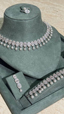 Close-up of bridal pearl drop necklace with sparkling crystal details