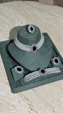 Luxury bridal pearl choker jewelry set with black zircon centerpiece and matching pieces