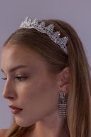 Close-up of a bridal tiara with marquise zircon leaf clusters, detailed silver settings and a radiant wedding finish