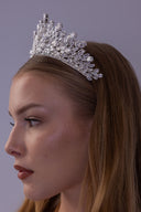 Teardrop zircon wedding tiara shown at an angle, with layered marquise branches and a dramatic statement silhouette for brides.