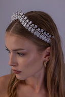 Teardrop leaf wedding tiara shown from the side, with graduated clear zircon stones and an elegant silver bridal crown setting.
