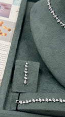 Teardrop bridal earrings and bracelet with fine zircon detailing