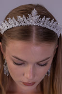 Luxury botanical wedding tiara shown at an angle, with sparkling marquise zircon leaves and a graduated royal silhouette