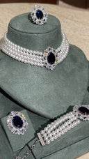 Elegant wedding pearl necklace with deep navy zircon and sparkling halo