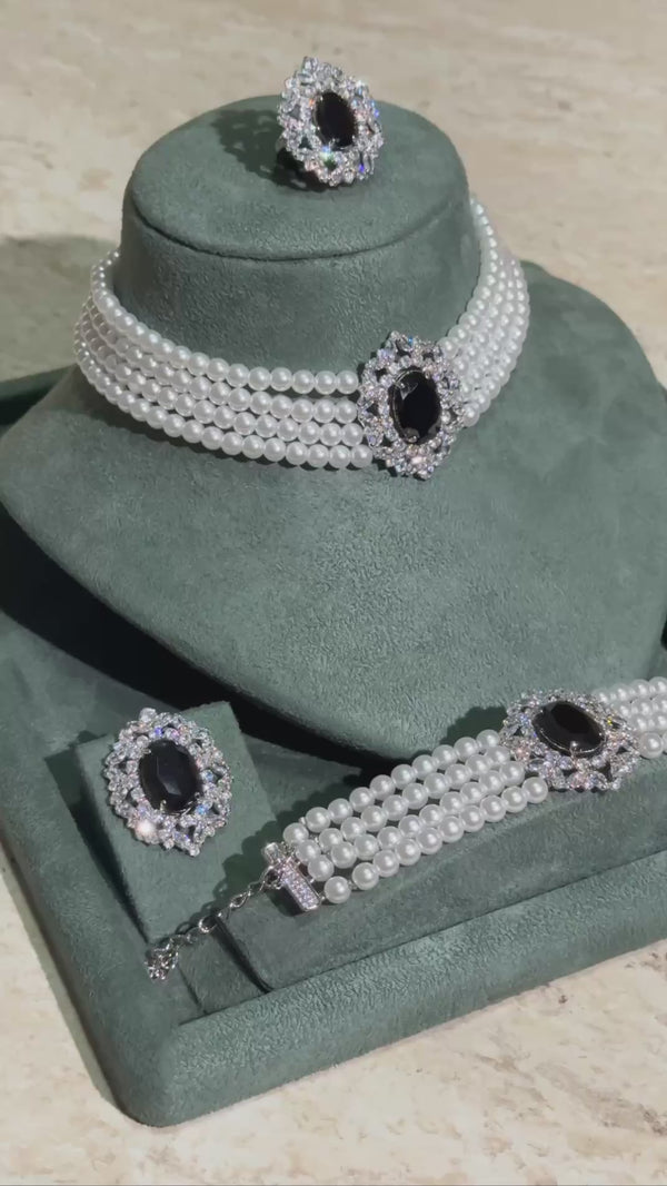 Luxury bridal pearl choker jewelry set with black zircon centerpiece and elegant wedding design