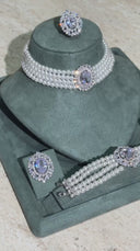 Luxury bridal pearl choker jewelry set with crystal zircon centerpiece and elegant wedding design