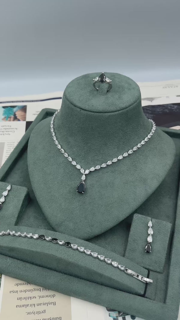 Nerissa bridal jewelry set video showing the black teardrop Riviera necklace earrings tennis bracelet and adjustable ring
