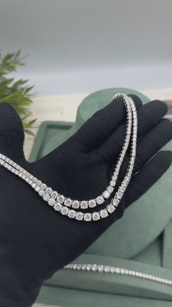 Delphine bridal wedding jewelry set video showing the double-row graduated tennis necklace, long earrings, bracelet and adjustable ring.