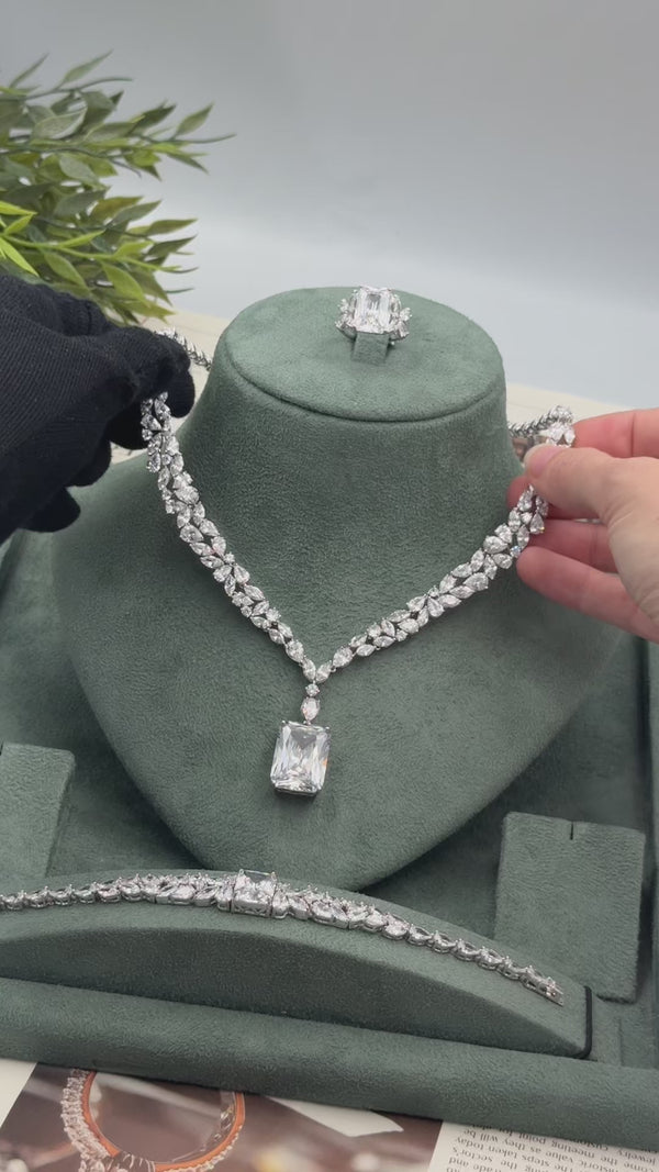 Lysara bridal wedding jewelry set video showing the emerald-cut pendant necklace, matching drop earrings, marquise bracelet and adjustable ring