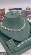 Elegant bridal pearl jewelry set with necklace earrings bracelet and ring
