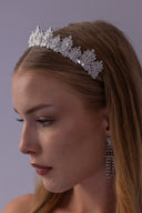 Side view of a silver-plated wedding tiara with sculpted AAAA zircon foliage clusters