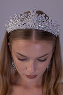 Side view of a silver statement bridal tiara featuring brilliant clear zircon branches and graduated teardrop accents