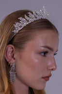 Close front view of a zircon wedding crown featuring marquise leaf stones, intricate branches and an elevated center design